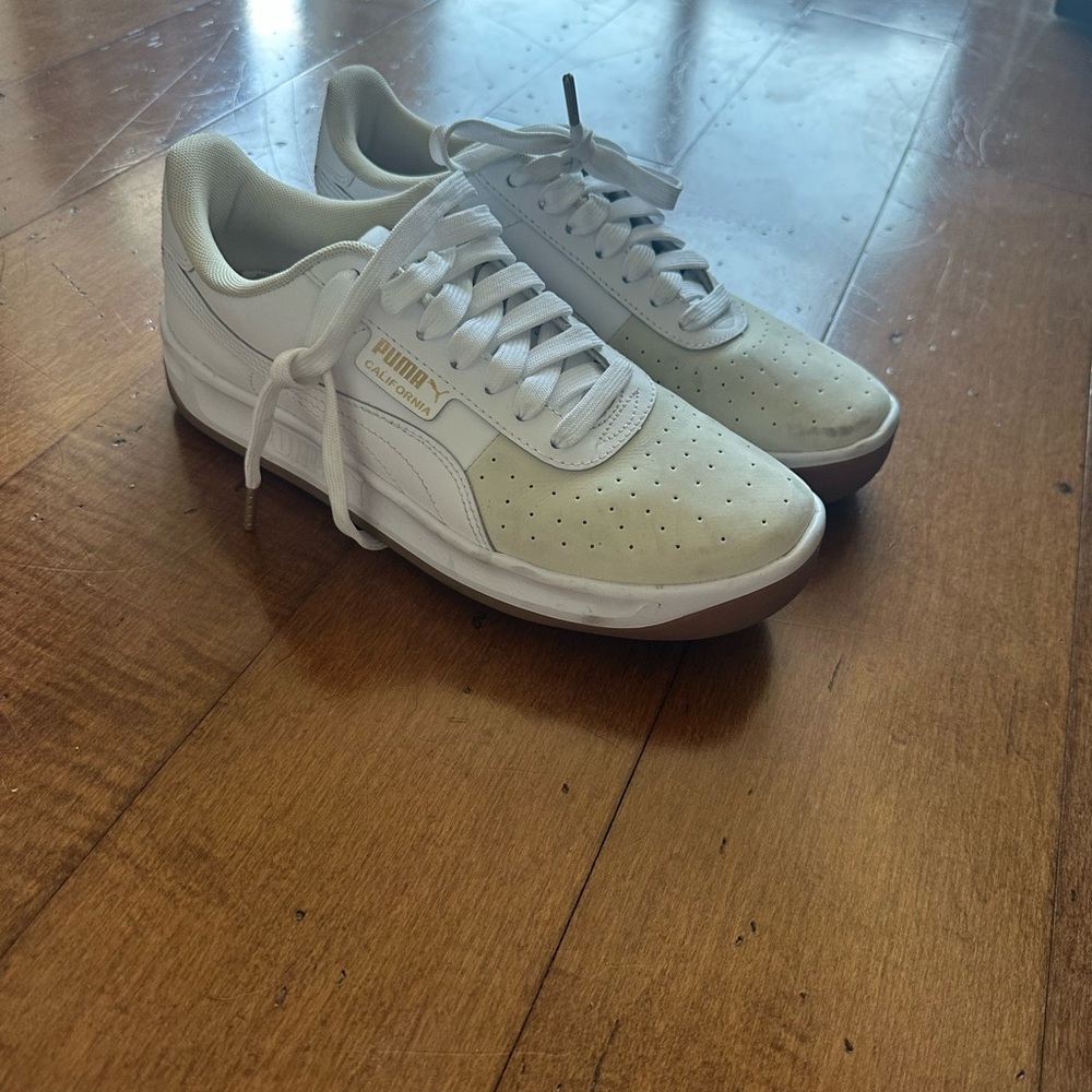 Puma women’s  White Sneakers